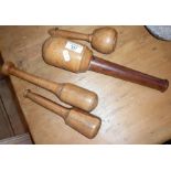 Four early boxwood and other wood mallets