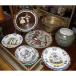 Two Quimper-type plates, two Austrian slipware wall plates and others with a 24" brass fender