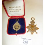 WW1 Star medal awarded to a PTE. L. E. FITZGERALD R.A.M.C., together with a 1922 singing medal