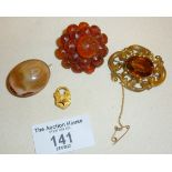 Antique jewellery, yellow metal brooches, amber cluster brooch and a tiny gilt padlock engraved with