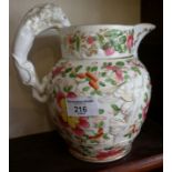 19th c. English commemorative jug with relief mask of George IV and a lion handle