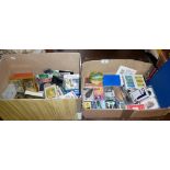Collection of assorted vintage playing cards and a folder of picture phone cards