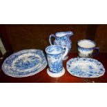 Blue and white china mugs, plates, butter dish and a Ringtons chintz jug
