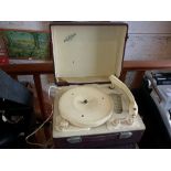 A vintage retro Babygram portable record player, together with a Supergrand wind-up gramophone