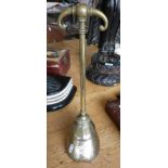 Victorian heavy brass doorstop in the form of a horses hoof with handle and having registration