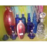 Collection of assorted glass bottles and vases