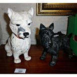 Painted spelter Scottie dog and an iron figure of a terrier with his leg cocked