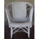 Painted wicker armchair