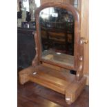 Victorian mahogany arch topped toilet mirror on platform base with lidded compartment