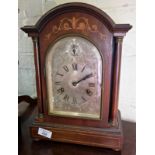 Edwardian inlaid mahogany arched top mantle clock, the chiming movement striking on a gong and