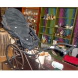 Continental wicker and metal dolls pushchair on two wheels