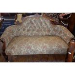 Victorian inlaid mahogany upholstered sofa with downswept arms standing on turned feet, 64" wide