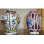 Two Chinese porcelain tea caddy vases, one with hairline crack, 11cm