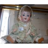 A bisque headed open mouthed doll impressed mark for Porzellanfabrik-Burggrub no.169