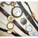Seven vintage wrist watches, inc. Accurist and a replica Rolex. Together with an antique Russian