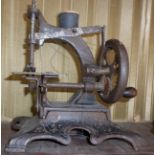 Victorian child's iron hand sewing machine