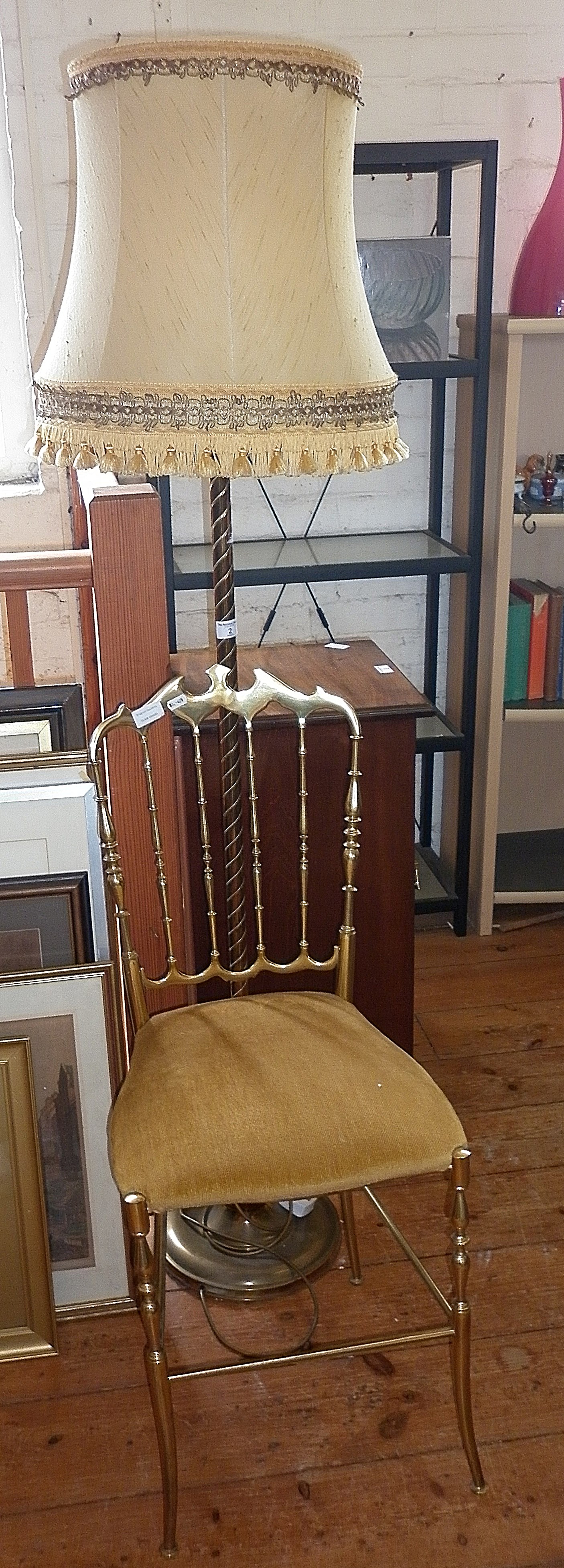 Brass standard lamp and a French metal salon chair