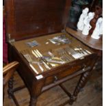 Edwardian oak canteen table on barley twist legs with fitted interior and drawer and assorted Mappin