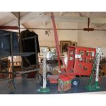 Vintage Triang tinplate toy crane, dolls tinplate pushchair, tinplate railway signal box and two