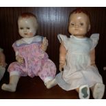 A Roddy of England composition doll (A/F) and a "Sarold" similar doll