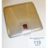 Art Deco silver powder compact with inset carnelian. Hallmarked inside for Birmingham 1933, John