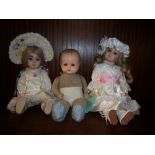 A PJM stamped bisque headed doll, a Kestner XI reproduction bisque doll and a German composition