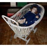 Painted basketwork dolls carriage with three various dolls
