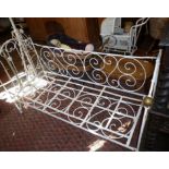 Victorian painted wrought ironwork folding cot/day bed or window seat with brass finials, 56" long