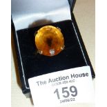 Vintage 9ct gold ring set with large citrine, approx UK size P and weight 7g.