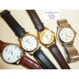 Four men's contemporary wrist watches, all apparently working