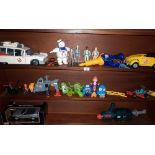1980's vintage collection of Ghostbusters figures and vehicles, inc. the ambulance and helicopter
