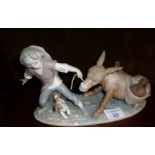 Lladro boy pulling donkey figural group