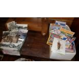 Two shoe boxes of assorted postcards and cigarette cards