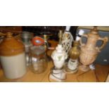 A vintage 'Blow' glass butter churn and six various table lamps and a one gallon stoneware flagon