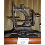 Victorian child's iron hand sewing machine