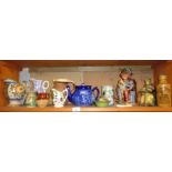 Shelf of pottery jugs and figures etc.