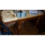 Light oak draw-leaf kitchen table