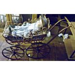 Victorian elaborate wickerwork child's dolls carriage having spoked carriage wheels with metal