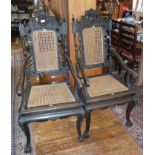 Pair of Victorian Anglo-Chinese carved wood armchairs with canework seats and backs