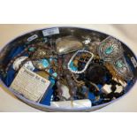 Tin of antique and vintage costume jewellery