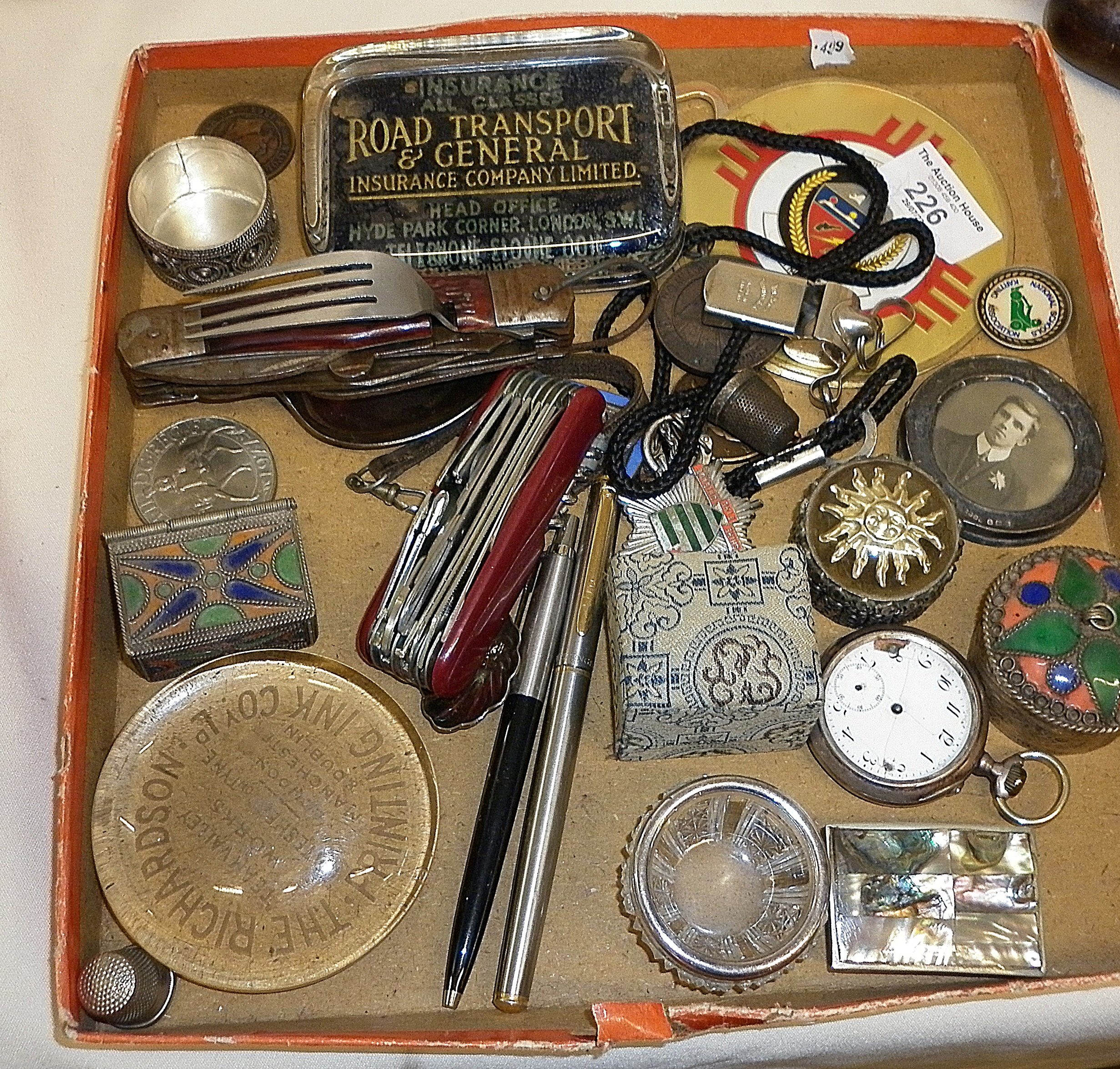 Tray of assorted items, advertising paperweights, silver photo frame, thimble, coins, medals etc