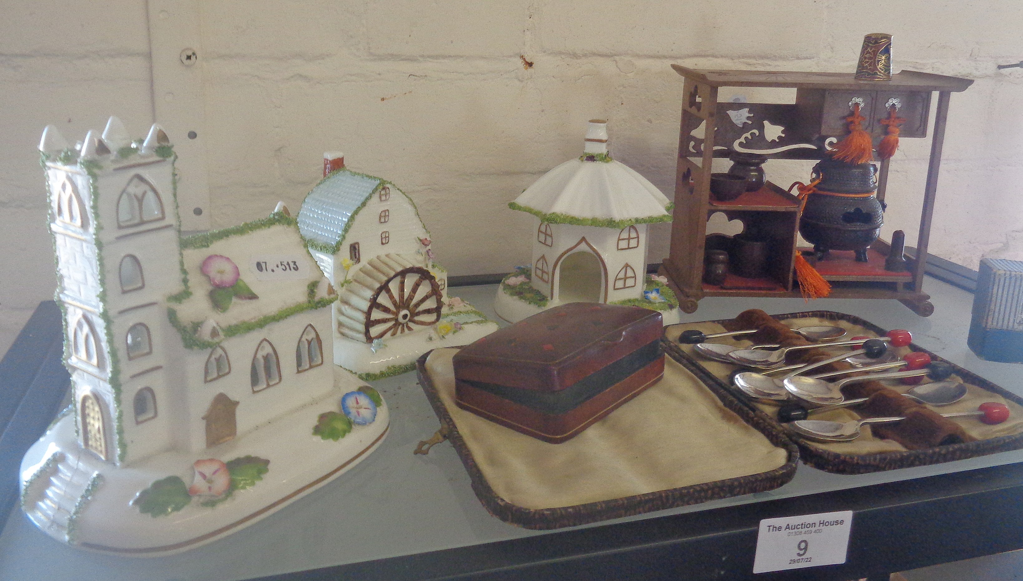 Three Coalport china cottages, Japanese model tea ceremony stand and coffee bean spoons, etc.