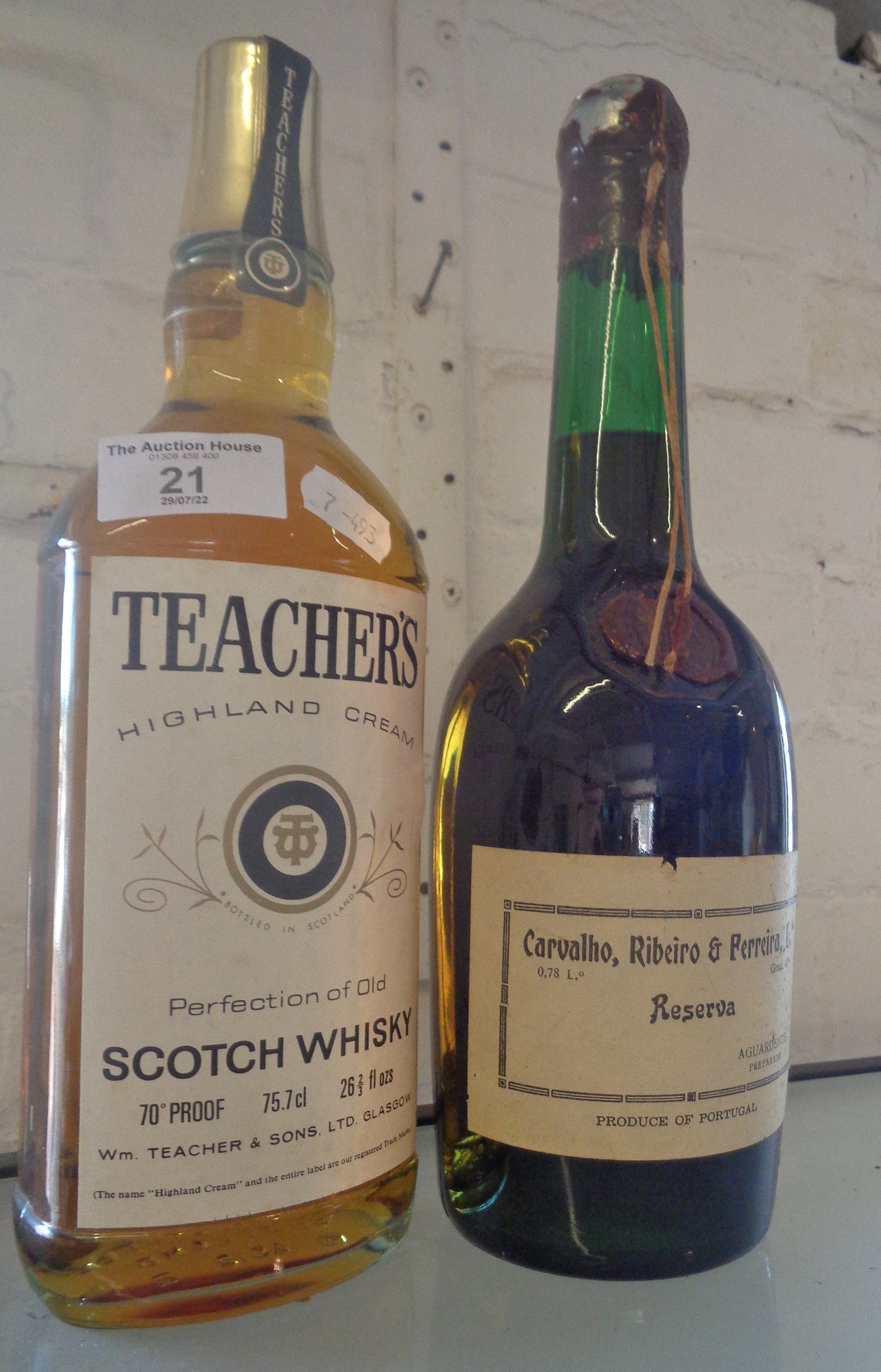 Vintage bottle of Teachers Whisky and a Portuguese red wine