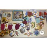 Assorted enamel badges and masonic jewels and medals, three silver inc. J. Tostrup of Norway