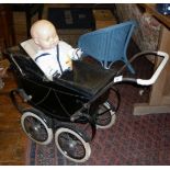 Triang coach built dolls pram with hood and cover, c.1950's and an "OK" Kader plastic baby doll