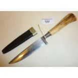 German hunting knife and scabbard with antler handle. Blade marked as GEBRUDER RAUH GRAFRATH -