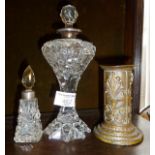 Two antique cut glass scent bottles with hallmarked silver collars, and an aesthetic movement candle