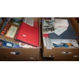 Two big boxes of assorted postcards and albums