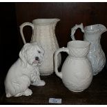 Three Victorian white glazed drabware jugs, and a casa pupo dog, A/F