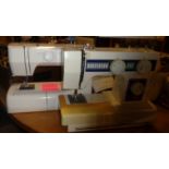 A Riccar Reliant sewing machine and a Janome electric sewing machine